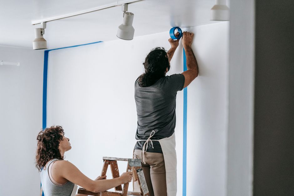 Professional painting team executing exterior work with precision